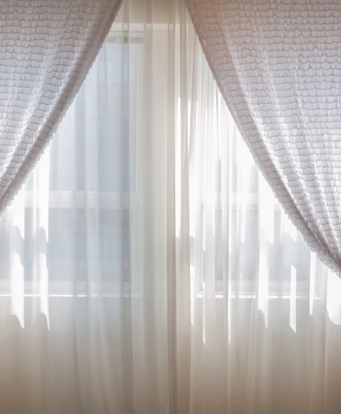 Airy sheer linen curtain filtering Chennai sunlight